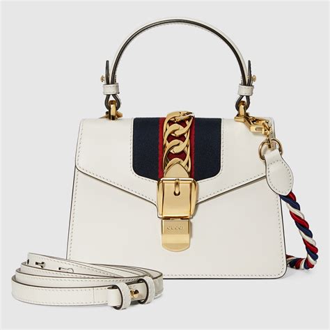 gucci sylvie medium size|Gucci mini handle bag.